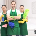 Cleaning service team at work in bedroom